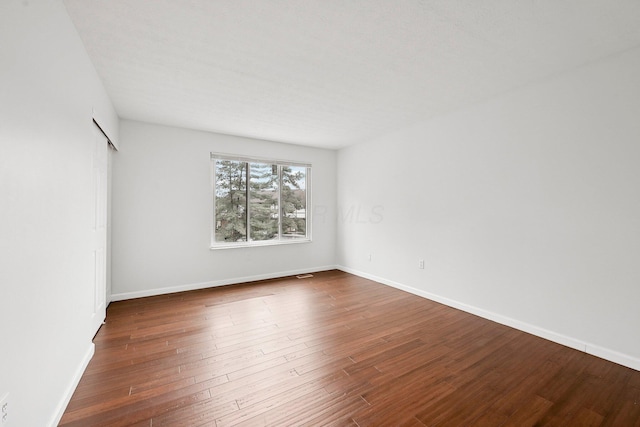 5692 Great Hall Ct, Columbus, OH 43231 - empty room with wood finished floors and baseboards