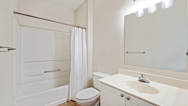 full bath with shower / bath combo, toilet, and vanity