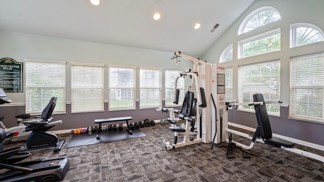 workout area with recessed lighting, carpet flooring, high vaulted ceiling, visible vents, and baseboards