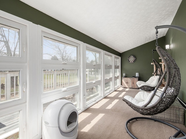 2600 Seneca Dr, London, OH 43140 - sunroom with plenty of natural light, carpet, lofted ceiling, and a textured ceiling