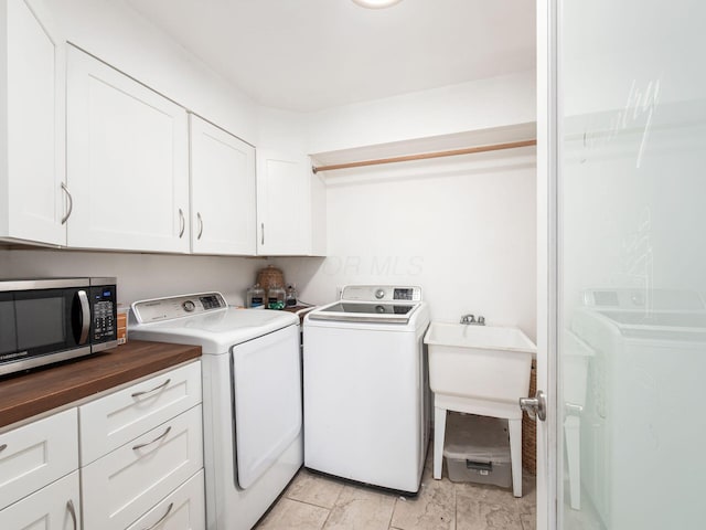 2600 Seneca Dr, London, OH 43140 - washroom featuring washer and dryer and cabinet space