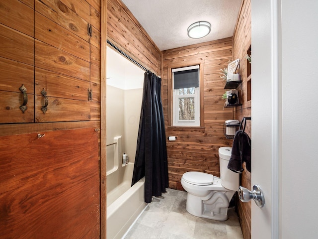 2600 Seneca Dr, London, OH 43140 - bathroom with shower / bath combination with curtain, toilet, wood walls, and a textured ceiling