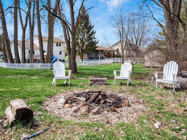 2600 Seneca Dr, London, OH 43140 - view of yard with a trampoline, a fire pit, and fence