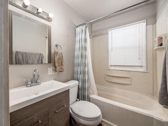 bathroom with toilet, shower / tub combo with curtain, and vanity