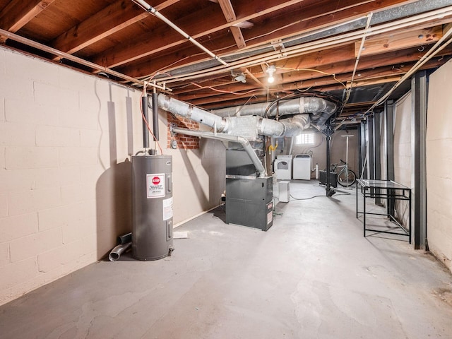 below grade area featuring heating unit and electric water heater