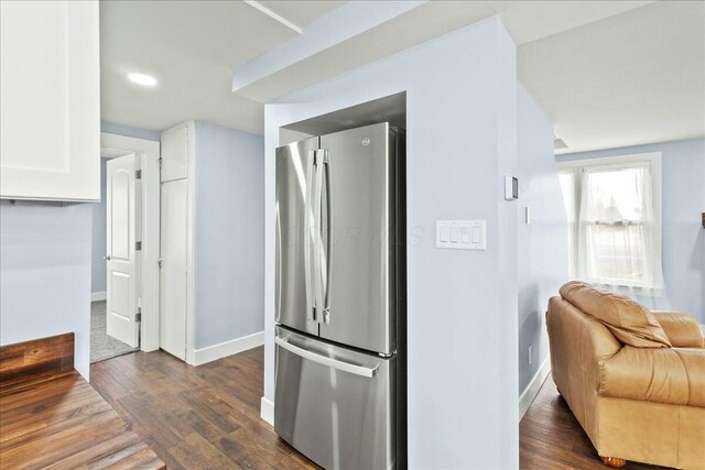 8119 State Route 366, Russells Point, OH 43348 - kitchen featuring freestanding refrigerator, white cabinets, baseboards, and dark wood finished floors