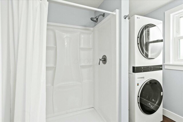 8119 State Route 366, Russells Point, OH 43348 - laundry room with stacked washer / dryer and laundry area