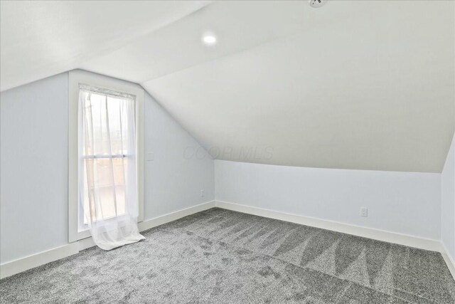 8119 State Route 366, Russells Point, OH 43348 - bonus room with baseboards, carpet flooring, vaulted ceiling, and recessed lighting