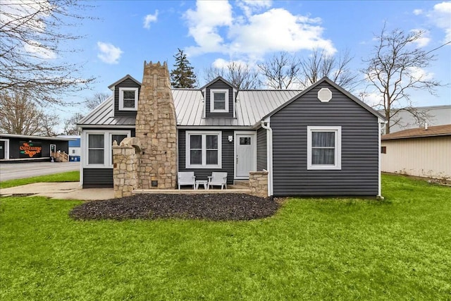 8119 State Route 366, Russells Point, OH 43348 - view of front of house featuring metal roof and a front yard