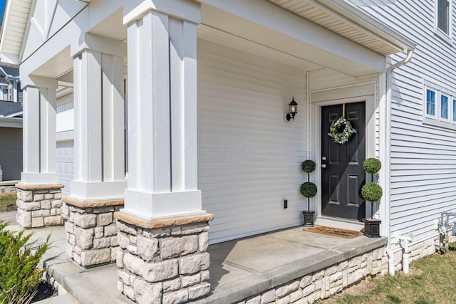 entrance to property with covered porch
