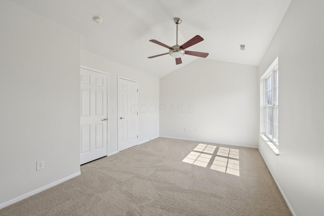1143 Green Knoll Dr, Westerville, OH 43081 - unfurnished bedroom featuring baseboards, visible vents, carpet, and vaulted ceiling