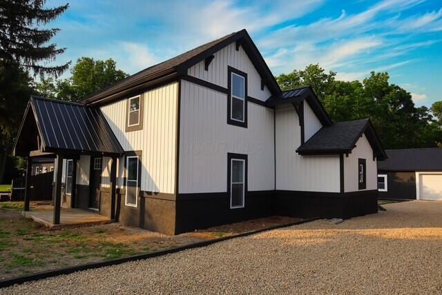 16786 Main St, Williamsport, OH 43164 - view of property exterior with a garage