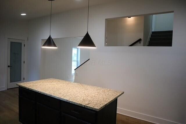 16786 Main St, Williamsport, OH 43164 - kitchen with dark wood-type flooring, a center island, recessed lighting, hanging light fixtures, and dark cabinets