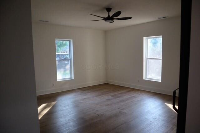 16786 Main St, Williamsport, OH 43164 - empty room with ceiling fan and wood finished floors