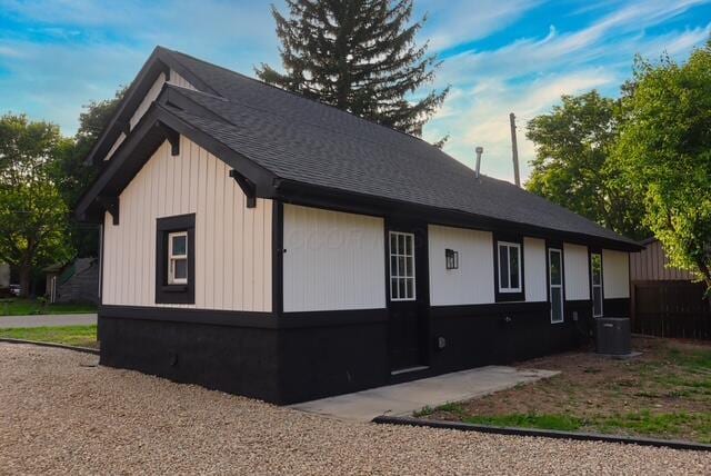 16786 Main St, Williamsport, OH 43164 - view of home's exterior featuring a central AC unit and a shingled roof