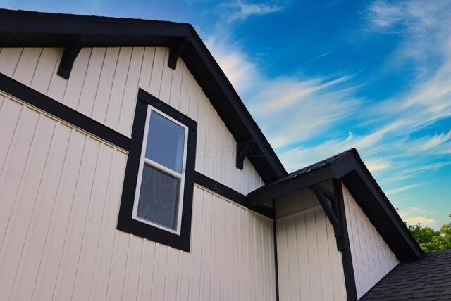 16786 Main St, Williamsport, OH 43164 - view of side of home featuring a shingled roof