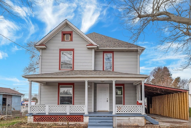 593 N State St, Marion, OH 43302 - view of front of house featuring a carport, covered porch, fence, and roof with shingles