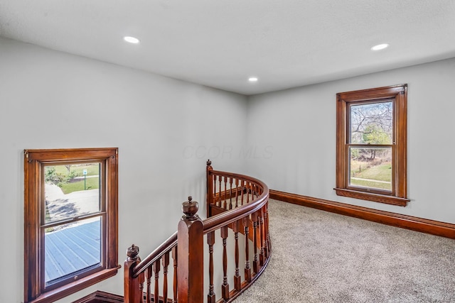 593 N State St, Marion, OH 43302 - hallway featuring baseboards, an upstairs landing, recessed lighting, and carpet