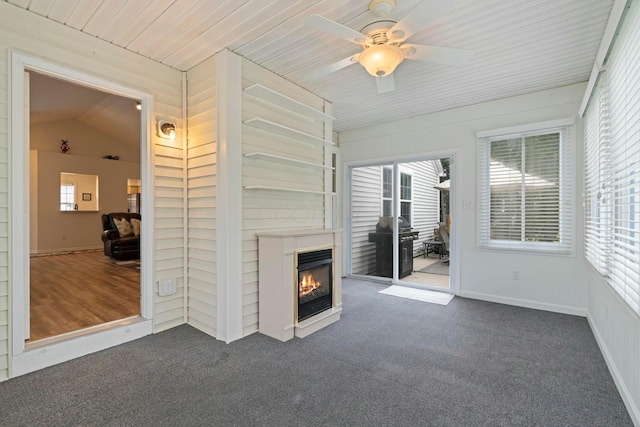 508 Straiton Sq, Westerville, OH 43082 - unfurnished living room with a ceiling fan, carpet, and a lit fireplace