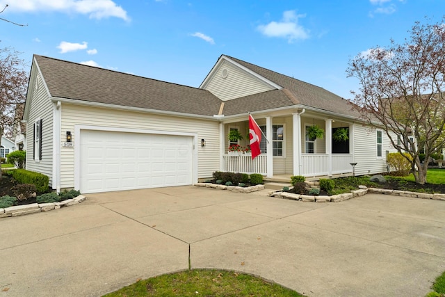 508 Straiton Sq, Westerville, OH 43082 - view of front of home featuring a shingled roof, driveway, an attached garage, and covered porch