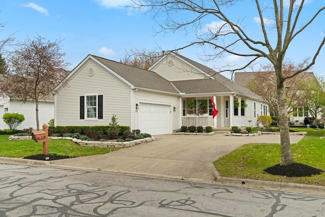 508 Straiton Sq, Westerville, OH 43082 - view of front facade featuring a front lawn, a garage, driveway, and roof with shingles