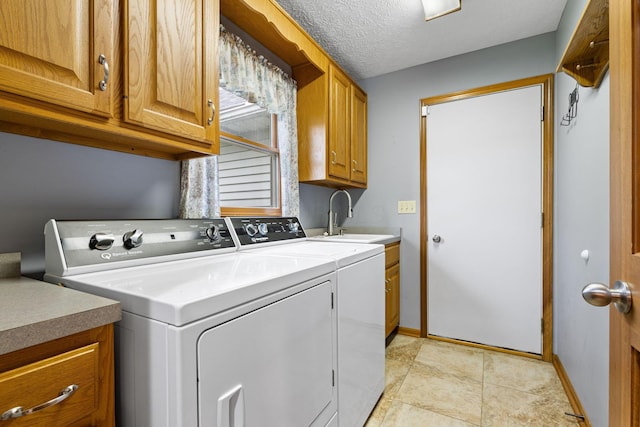 2816 Quail Run Ct, Mansfield, OH 44904 - laundry area with washing machine and clothes dryer and cabinet space