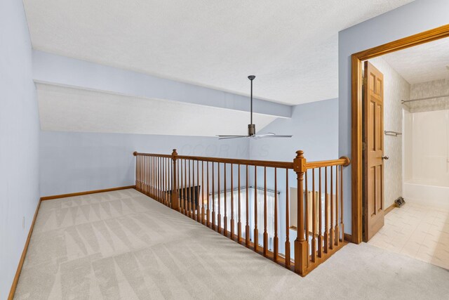 2816 Quail Run Ct, Mansfield, OH 44904 - hallway featuring carpet flooring and lofted ceiling