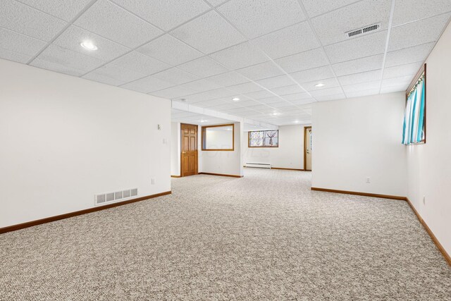 2816 Quail Run Ct, Mansfield, OH 44904 - spare room featuring light colored carpet, baseboard heating, recessed lighting, and a drop ceiling