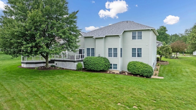 2816 Quail Run Ct, Mansfield, OH 44904 - rear view of property with a lawn, a deck, and roof with shingles