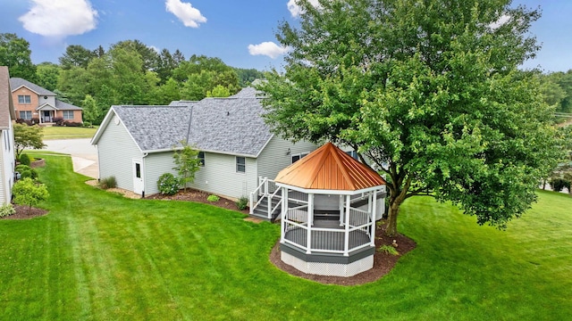 2816 Quail Run Ct, Mansfield, OH 44904 - rear view of house with roof with shingles, a gazebo, and a lawn