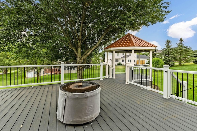 2816 Quail Run Ct, Mansfield, OH 44904 - wooden terrace with a lawn, a gazebo, and a fire pit