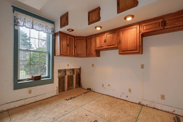 2085 US Highway 62 NE, Washington Court House, OH 43160 - kitchen featuring brown cabinetry and visible vents