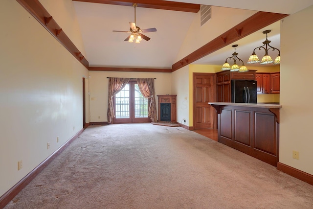 2085 US Highway 62 NE, Washington Court House, OH 43160 - unfurnished living room featuring baseboards, ceiling fan, high vaulted ceiling, and carpet floors