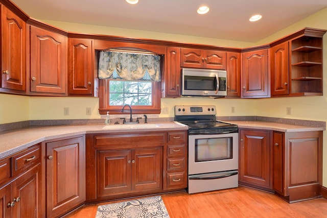 2085 US Highway 62 NE, Washington Court House, OH 43160 - kitchen featuring light wood finished floors, stainless steel appliances, recessed lighting, a sink, and open shelves