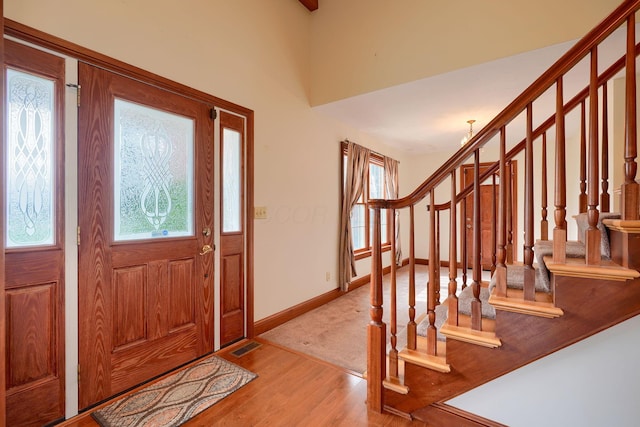 2085 US Highway 62 NE, Washington Court House, OH 43160 - foyer with visible vents, baseboards, stairs, and wood finished floors