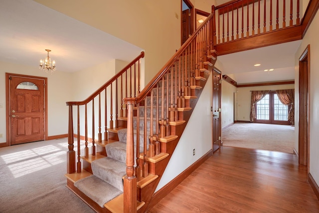 2085 US Highway 62 NE, Washington Court House, OH 43160 - entrance foyer with carpet flooring, a notable chandelier, baseboards, and stairs