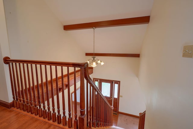 2085 US Highway 62 NE, Washington Court House, OH 43160 - stairway with high vaulted ceiling, baseboards, beam ceiling, a notable chandelier, and wood finished floors