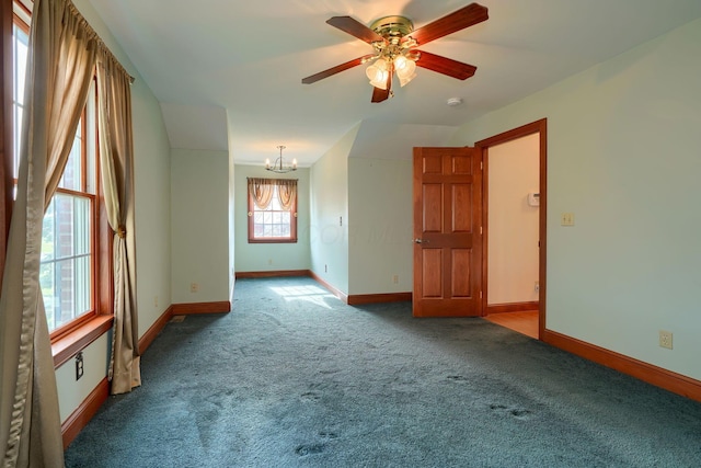 2085 US Highway 62 NE, Washington Court House, OH 43160 - carpeted empty room featuring baseboards and ceiling fan with notable chandelier