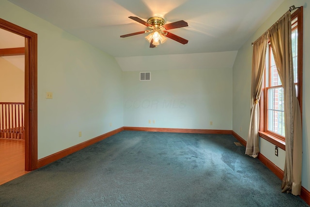 2085 US Highway 62 NE, Washington Court House, OH 43160 - carpeted empty room featuring baseboards, ceiling fan, visible vents, and vaulted ceiling