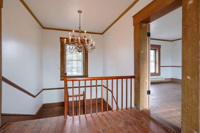 2085 US Highway 62 NE, Washington Court House, OH 43160 - stairway featuring hardwood / wood-style flooring, baseboards, a chandelier, and crown molding
