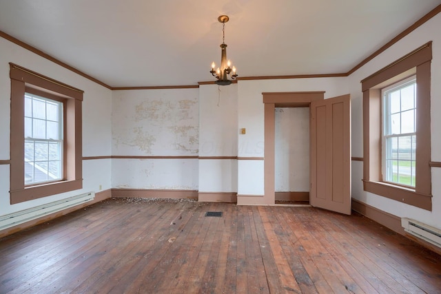 2085 US Highway 62 NE, Washington Court House, OH 43160 - spare room with wood-type flooring, ornamental molding, baseboards, and a chandelier