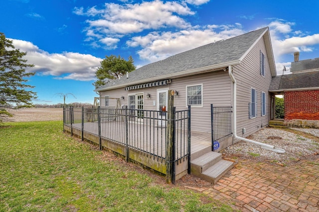 2085 US Highway 62 NE, Washington Court House, OH 43160 - back of house featuring a shingled roof, fence, and a yard