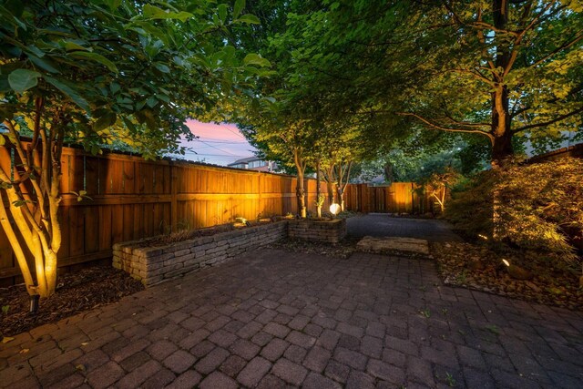 183 E 1st Ave, Columbus, OH 43201 - fenced backyard with a patio area