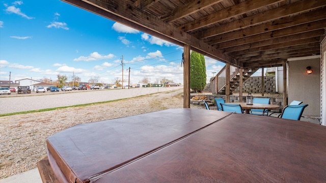 view of patio / terrace with outdoor dining area and stairway