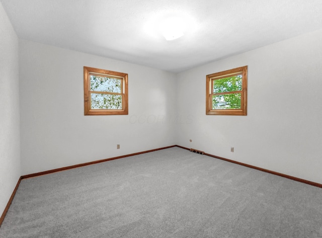 1330 Darcann Dr, Columbus, OH 43220 - empty room with carpet floors and baseboards
