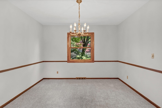 1330 Darcann Dr, Columbus, OH 43220 - carpeted spare room with a chandelier and baseboards