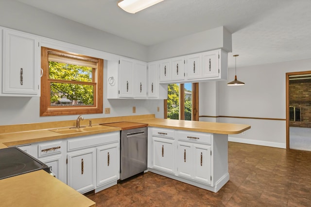 1330 Darcann Dr, Columbus, OH 43220 - kitchen featuring dishwasher, a peninsula, a sink, and white cabinetry