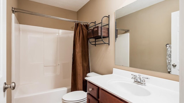 full bathroom with shower / bath combination with curtain, toilet, and vanity