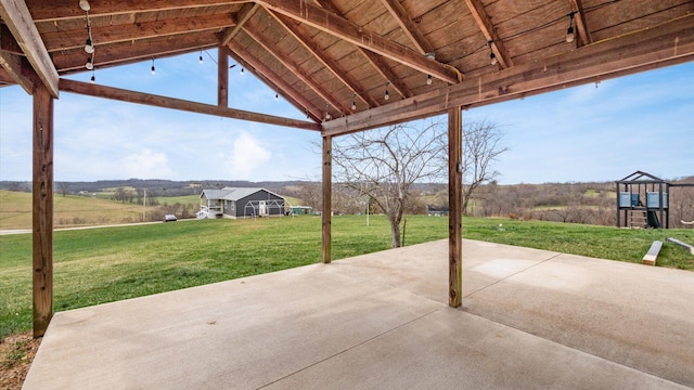 view of patio / terrace with a rural view