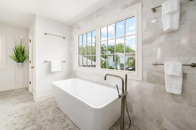 2252 Club Rd, Upper Arlington, OH 43221 - bathroom featuring a freestanding tub and baseboards